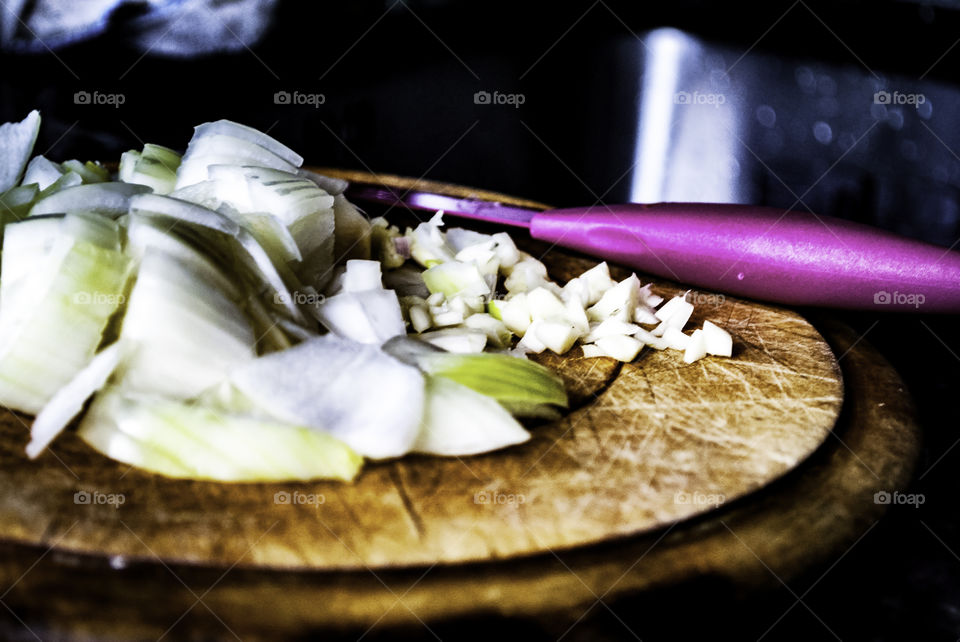garlic and onions on the chopping board