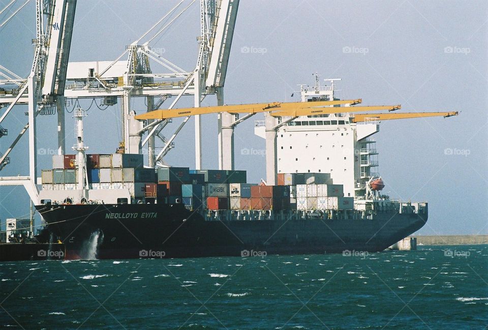 cargo boat unloading. 35mm Canon film camera.