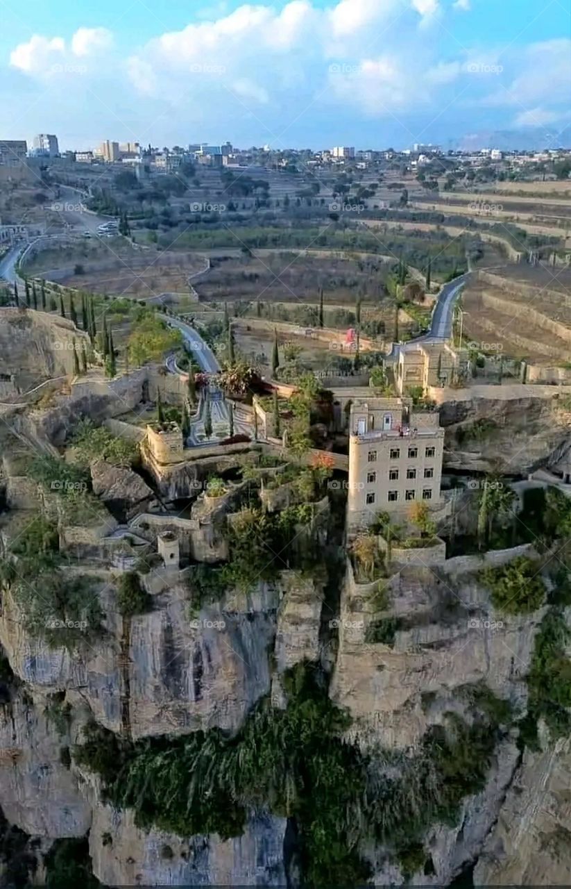 A very beautiful picture, and there is no better picture than it. There is no better picture of green herbs and colorful, red and white roses than it. Glory be to God, the natural and picturesque view, and there is no more