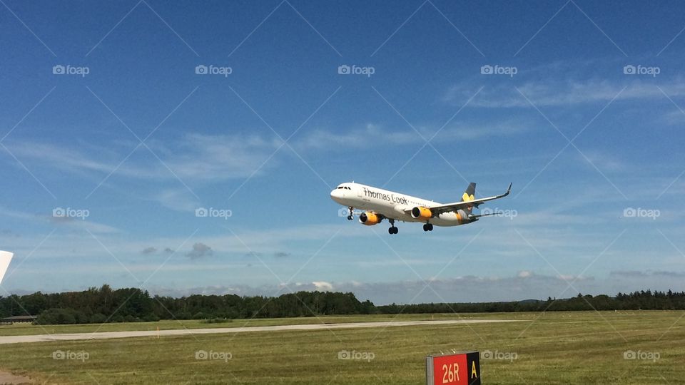 Airplane Landing . Took this photo while I was waiting to take off with my airplane 