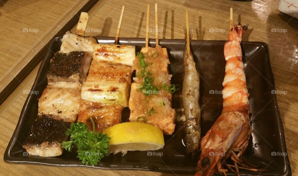 Japanese cuisine barbecue fish , prawn