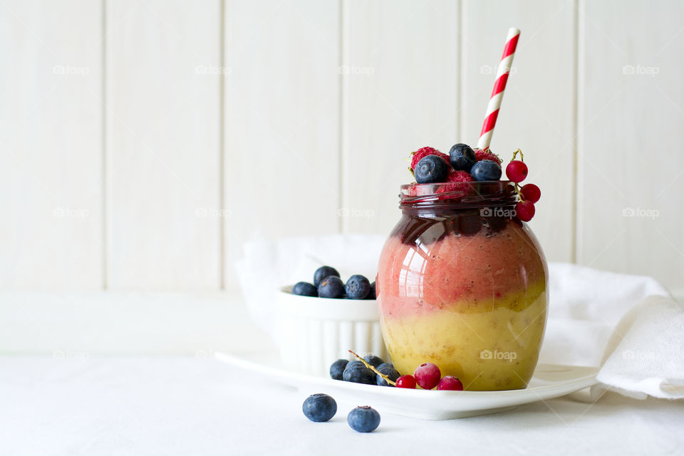 Smoothie with blueberries and raspberries