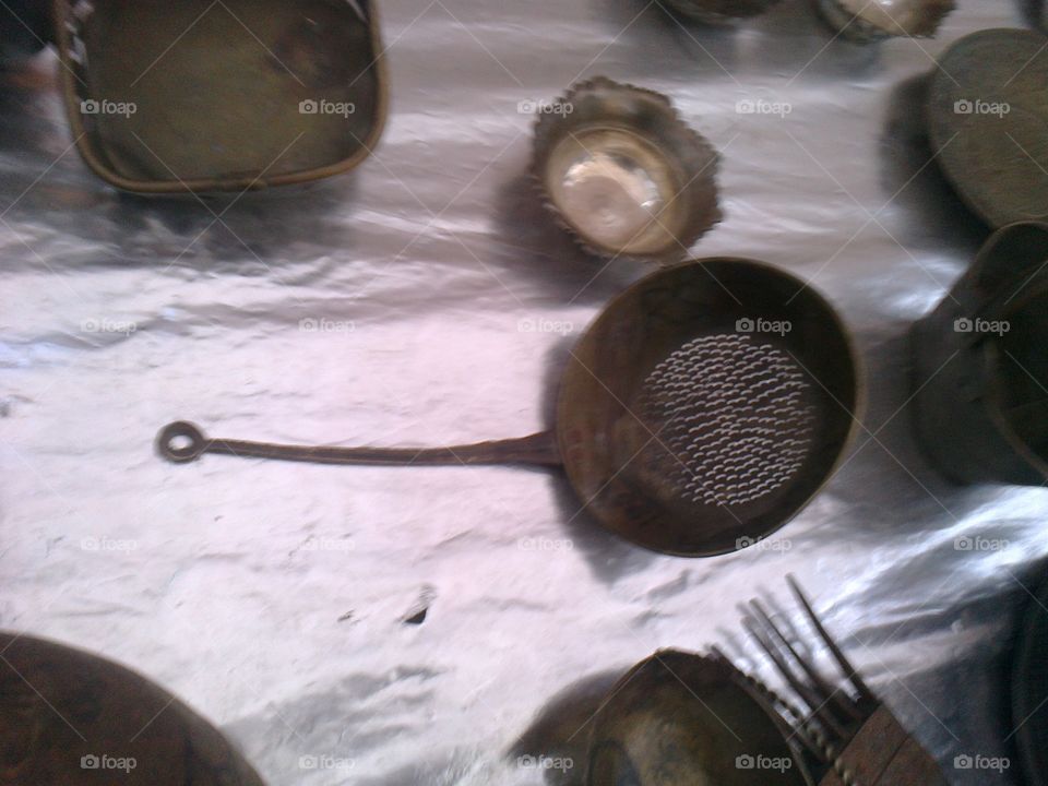 old antique tea strainer.