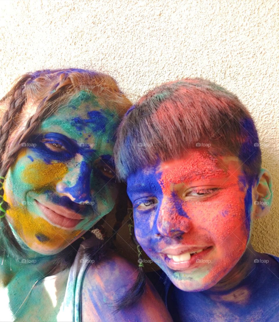 mother and son taking a selfie with colors of love