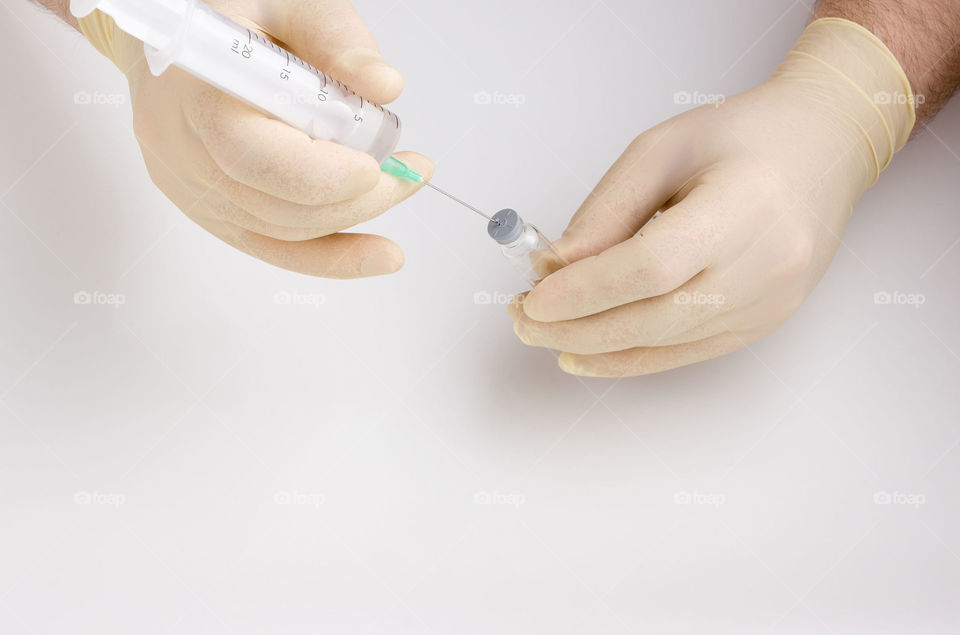 Syringe in hands