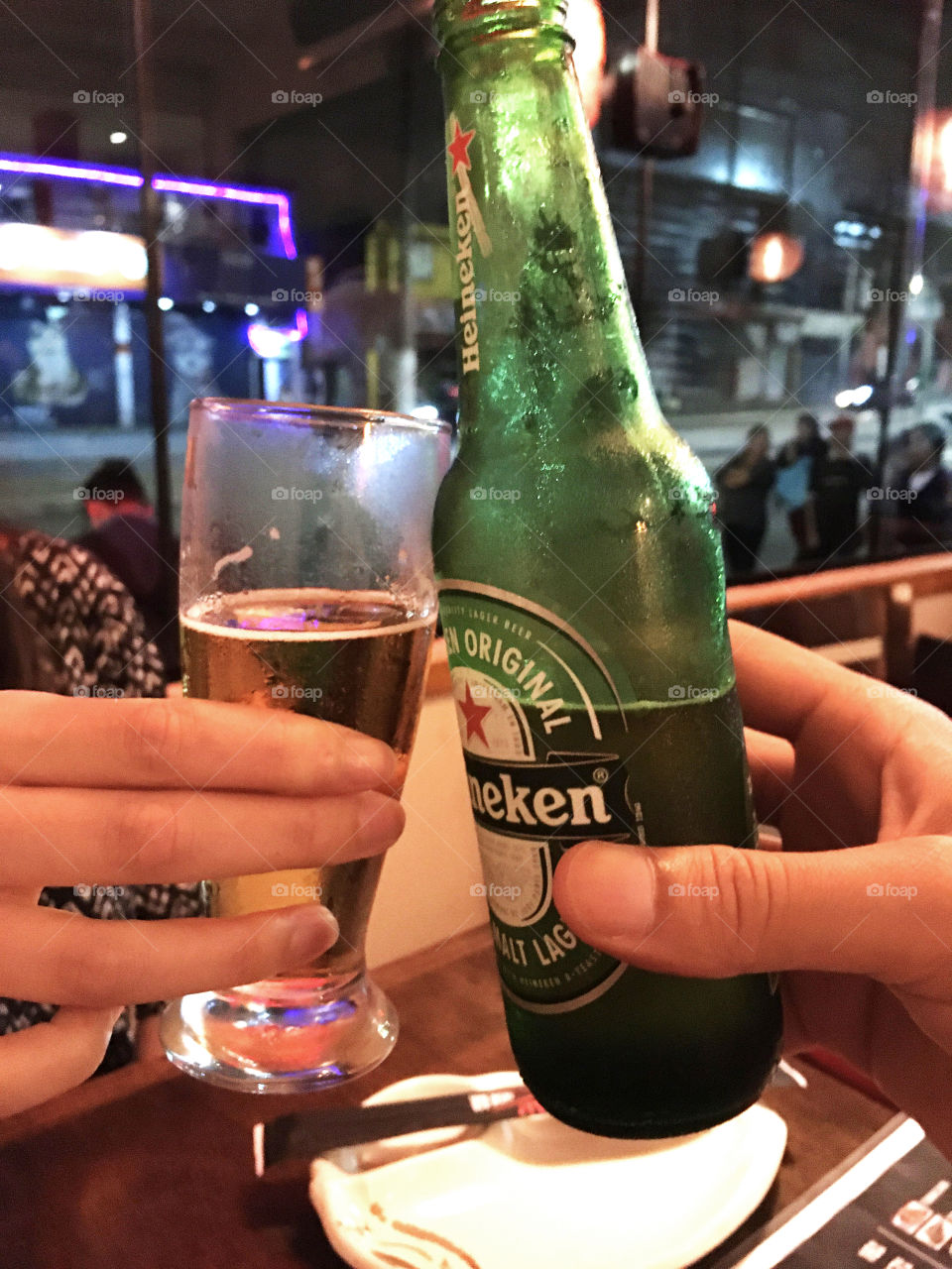 Beer served in a restaurant in São Paulo before the pandemic and before the quarantine period. Happy hour with friends. Food concept. Mexican food concept.
