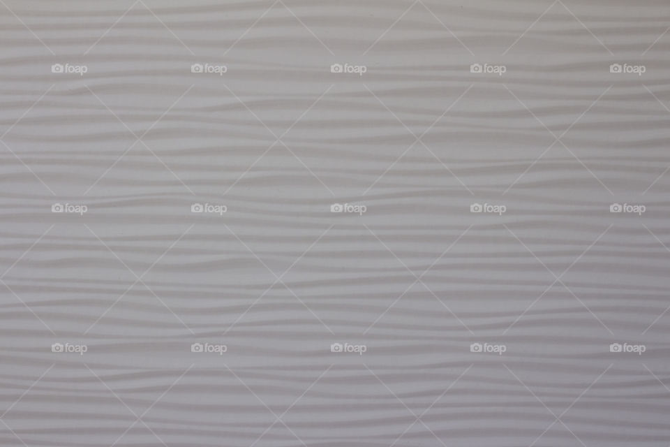 Texture , wave pattern on white cabinet cover 