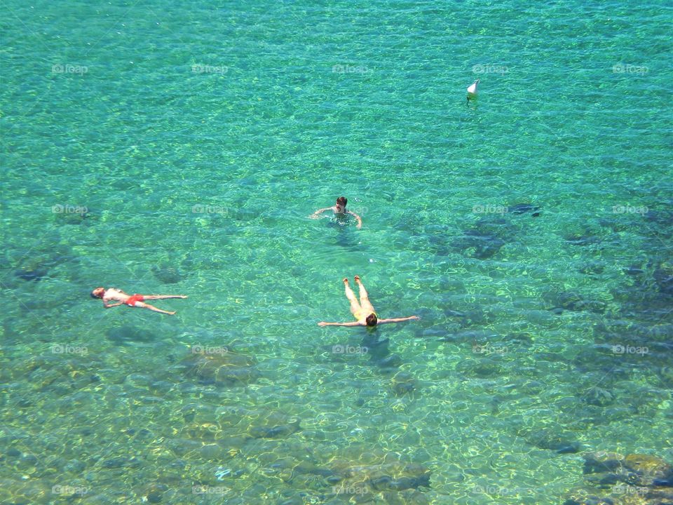 Swimming in the sea of Palinuro (Italy).