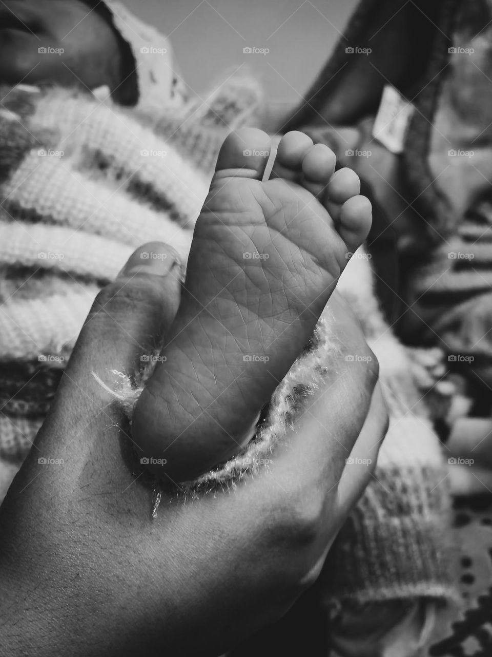 Cute little feet of my newborn baby