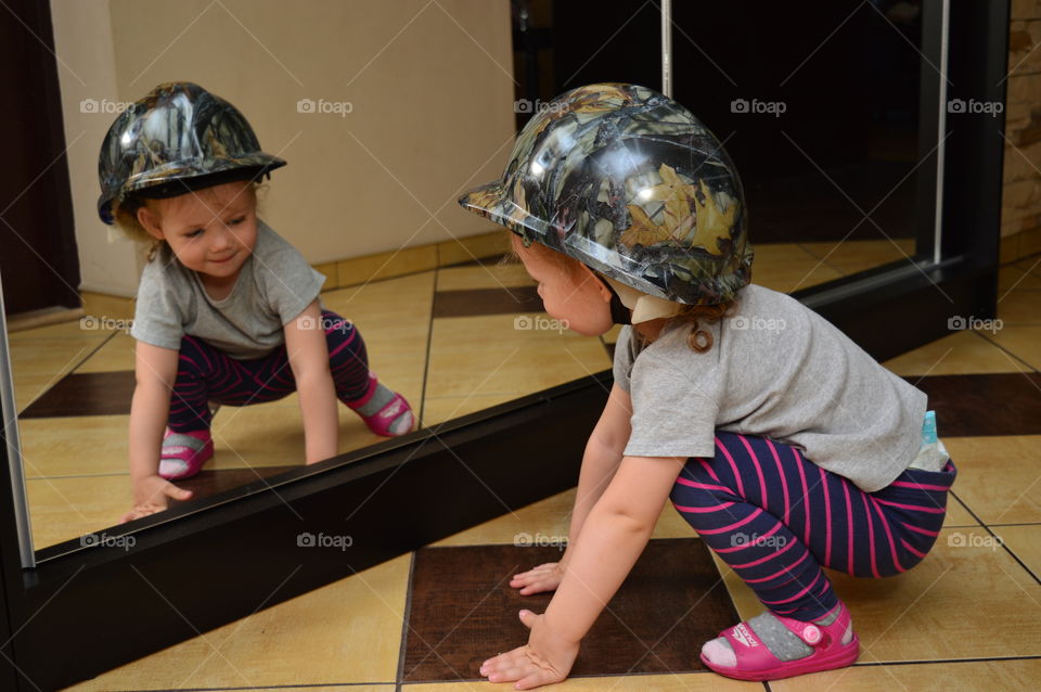 Child in a unique helmet