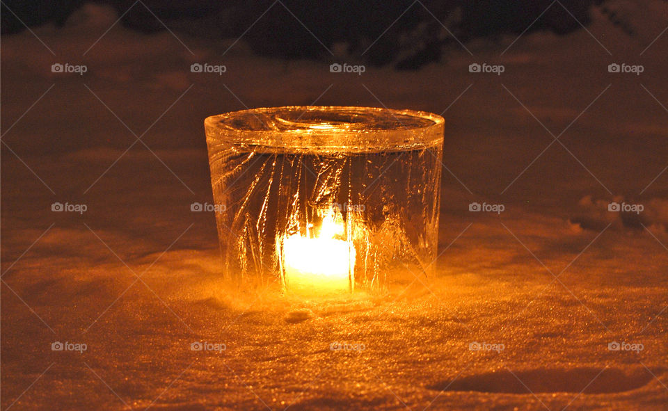 Ice lantern made in a bucket.