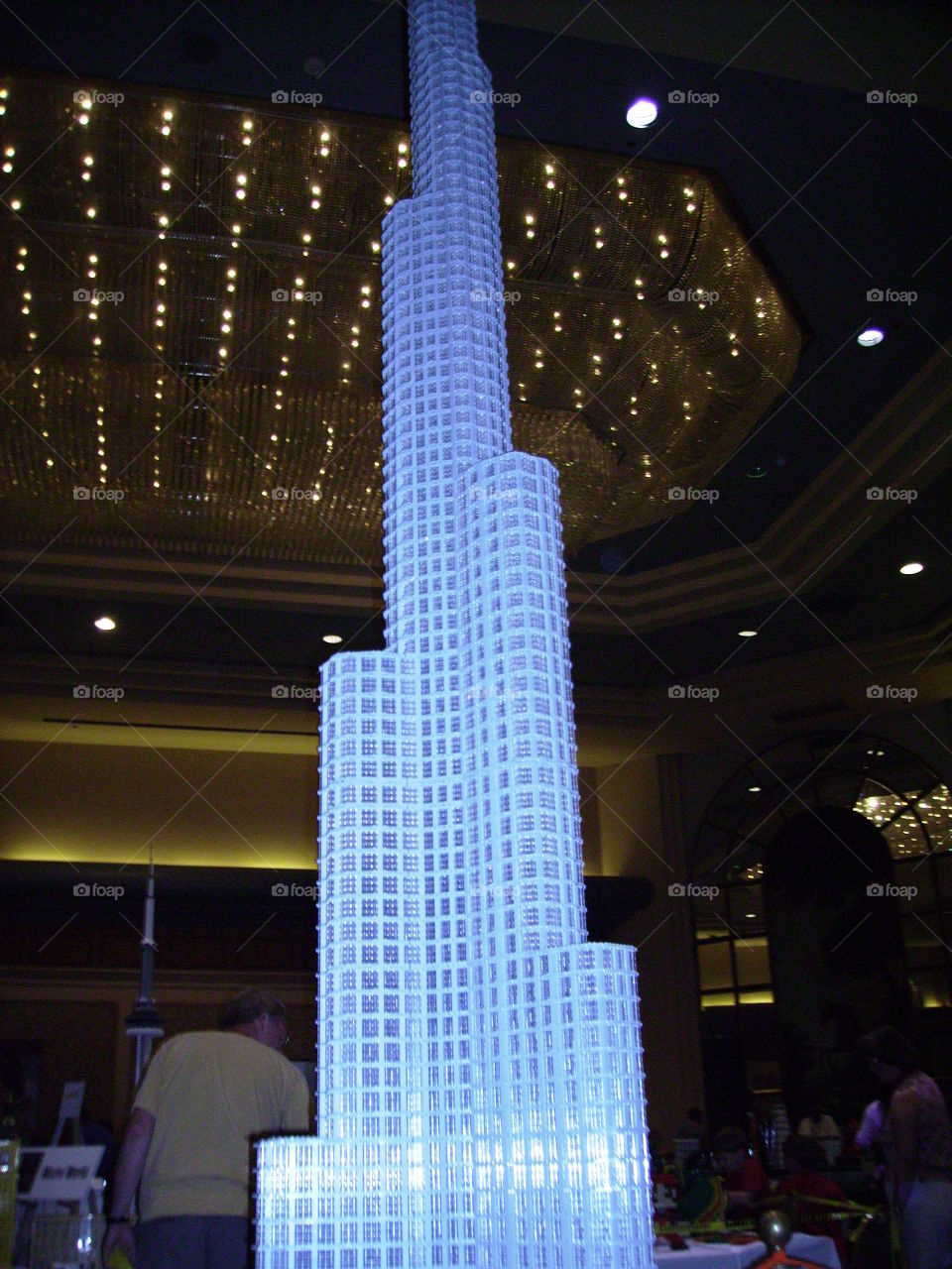 Giant tower made out of Legos on display during a Lego convention