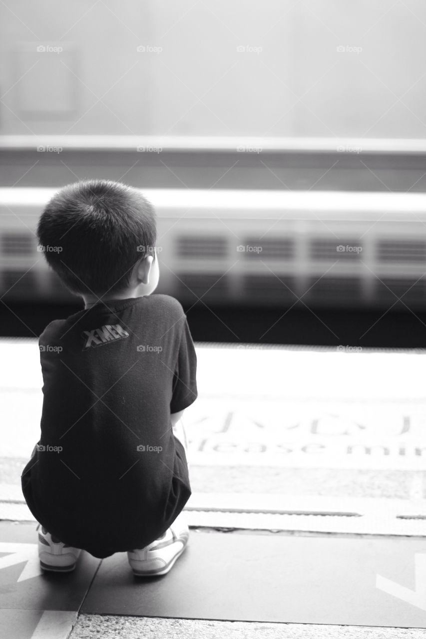 alone child train boy by fostertown