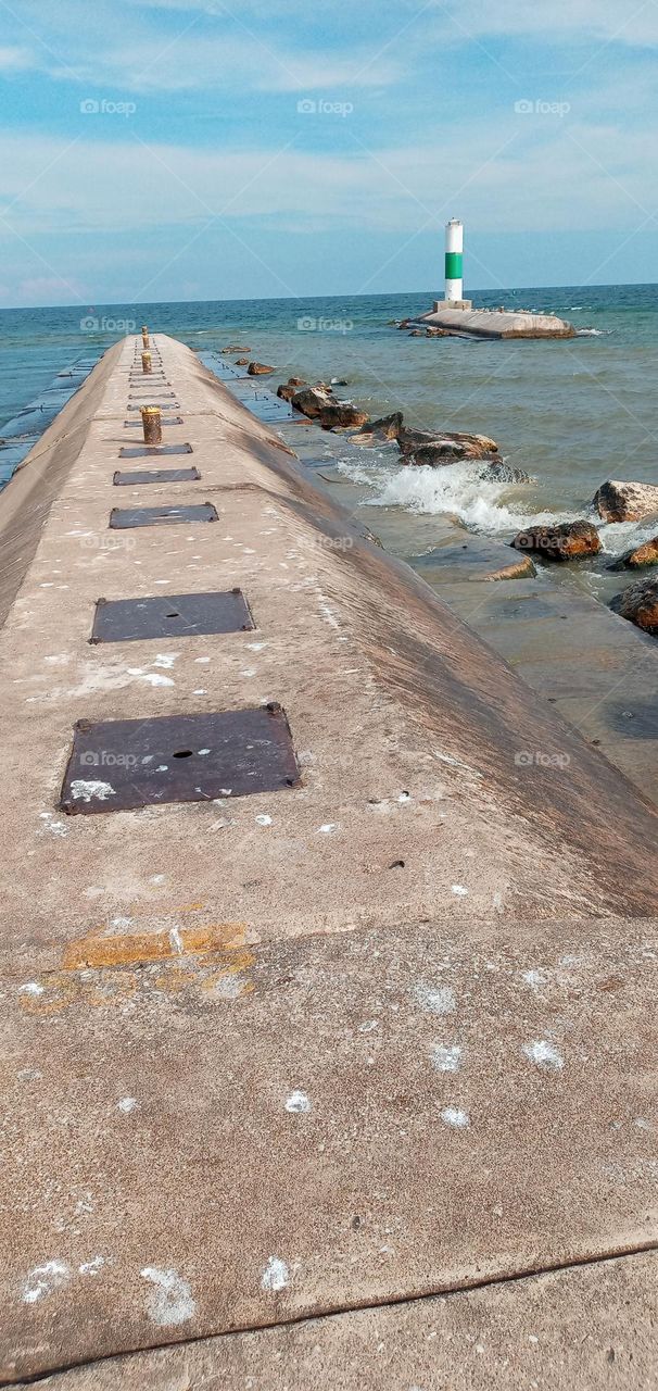 Water Crashing On The Rocks