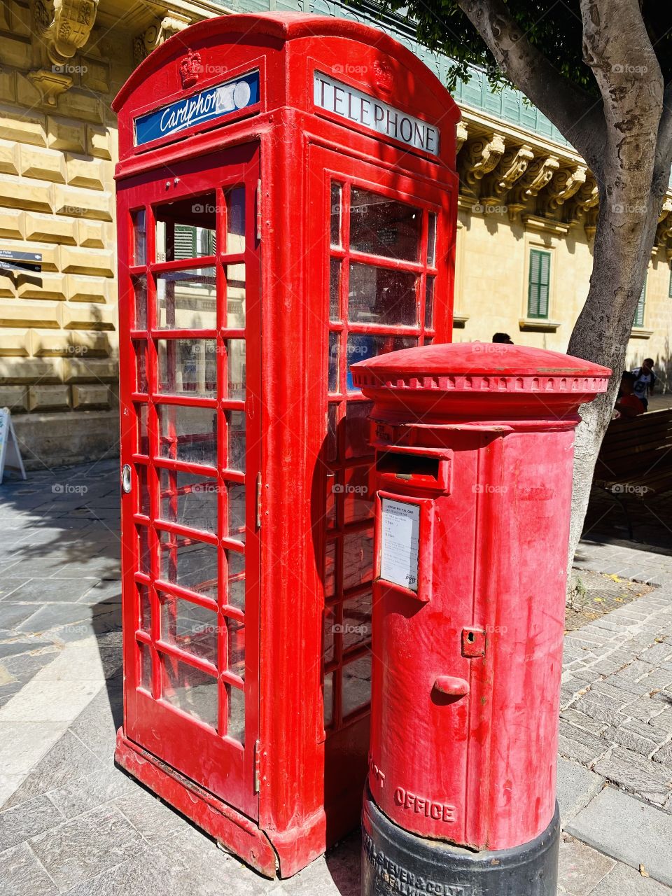 Red telephone booth and red English-style mailbox