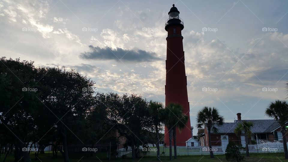 lighthouse at sunset. lighthouse in Daytona beach