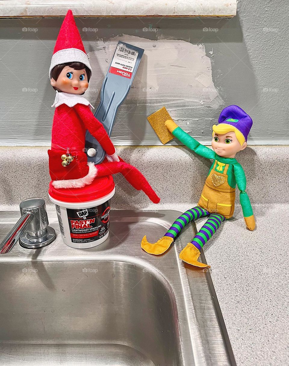 Elf on the shelf antics, elf on the shelf helpers, patching holes on the walls, elves helping Mommy