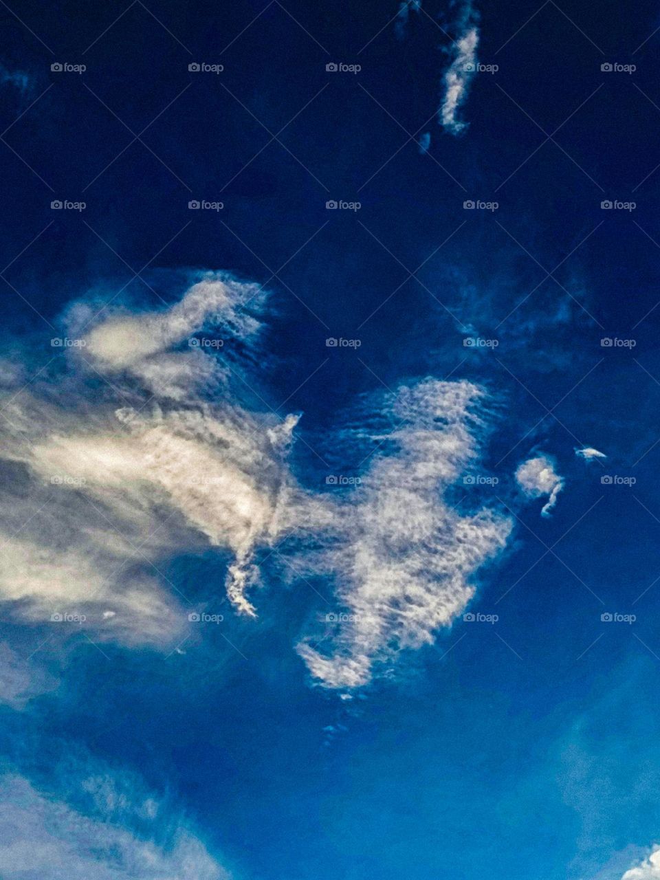 I want to show white clouds and blue sky in this photo.  The sky looks very beautiful with clouds and blue sky.