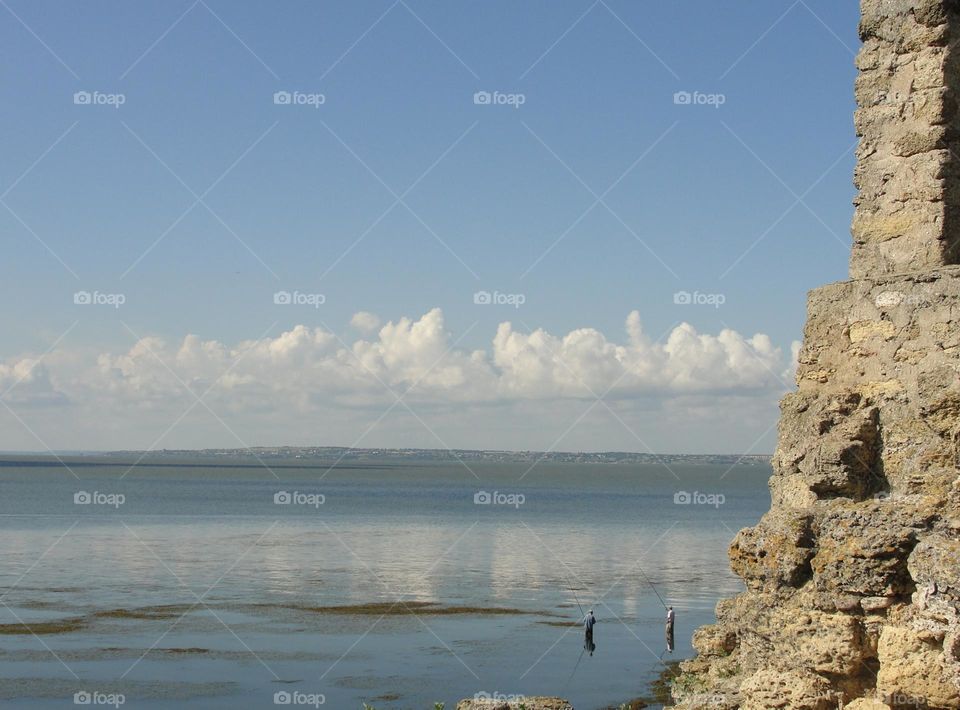 Seascape with reflection of clouds in the sea