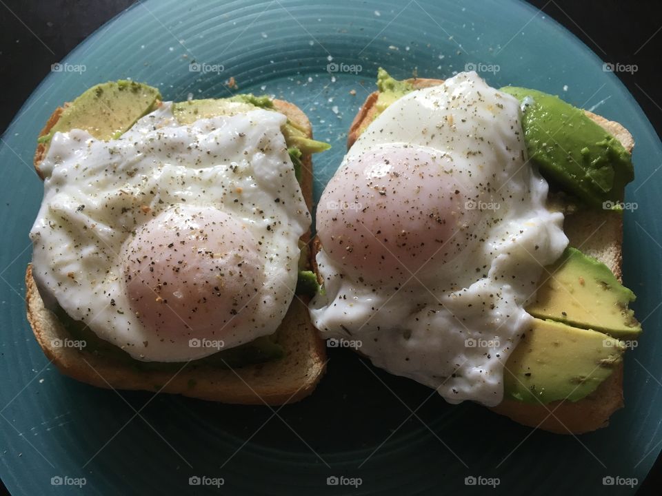 Poached eggs and avocado on toast