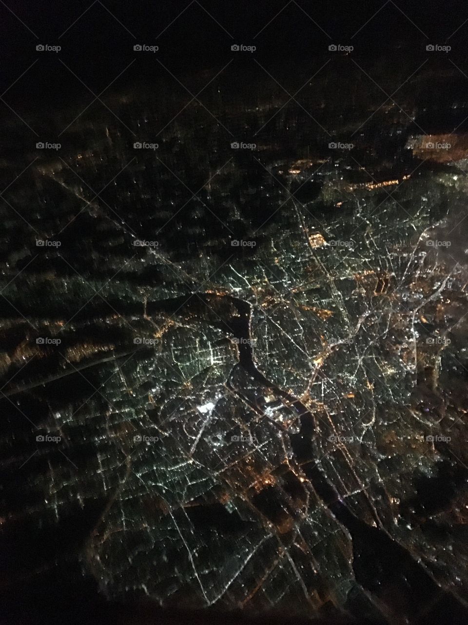 Aerial photo from a plane at night for Cairo, Egypt.