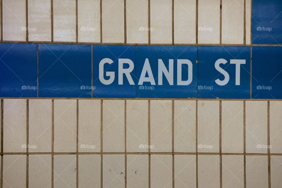 Tilled  wall of the Grand Street New York City underground subway station in Manhattan's Chinatown.