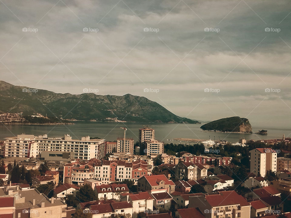 city, mountains, sea and sky