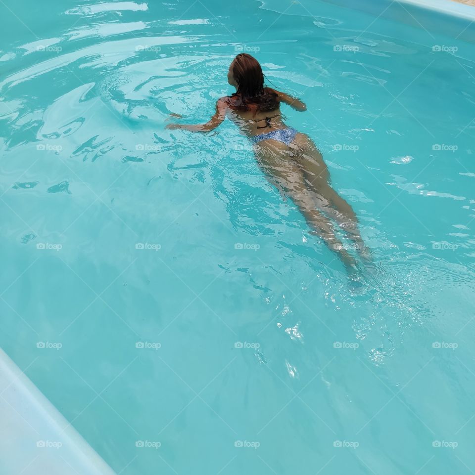 Girl in the pool