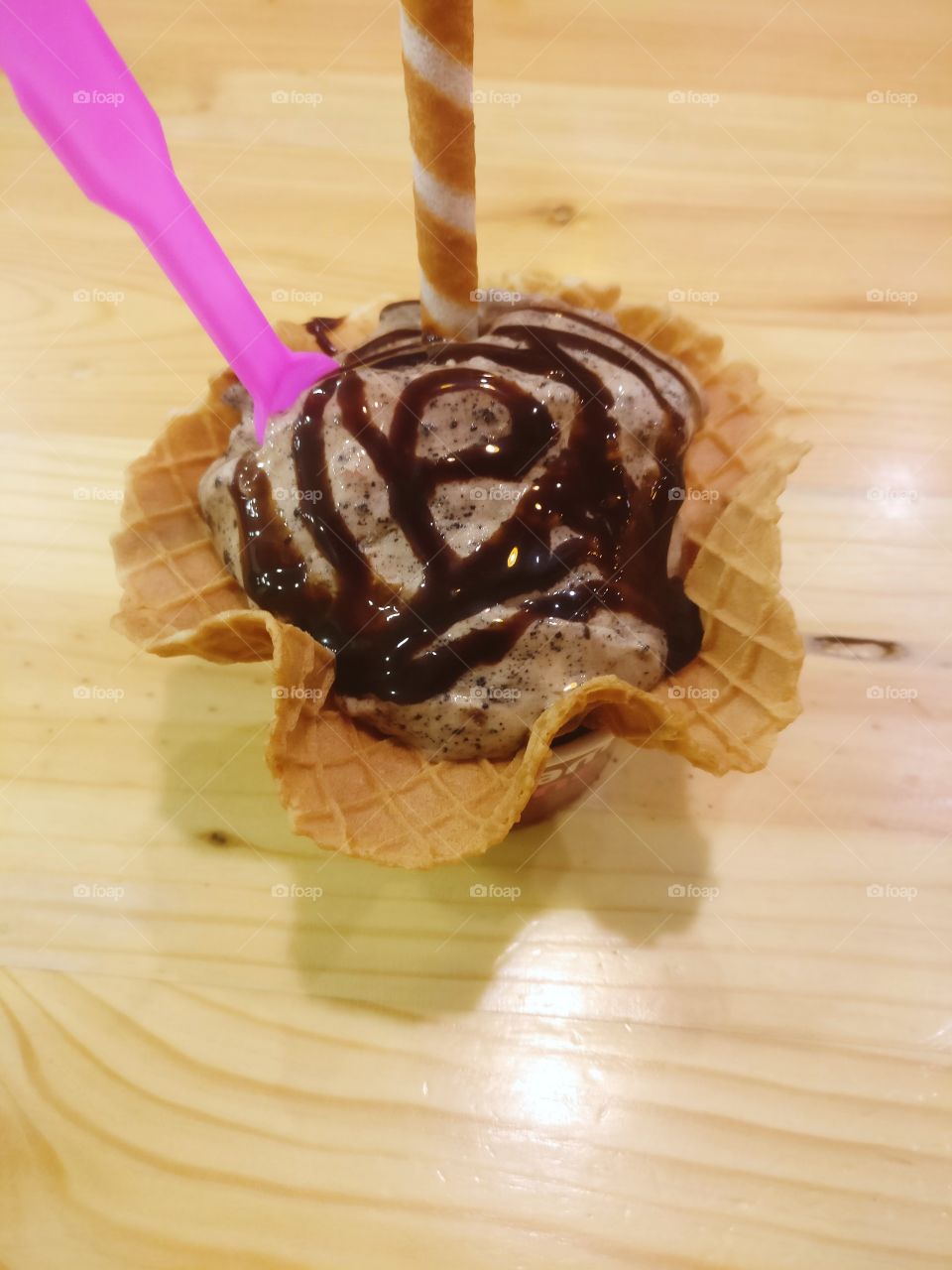 chocolate ice cream in a wafer cup
