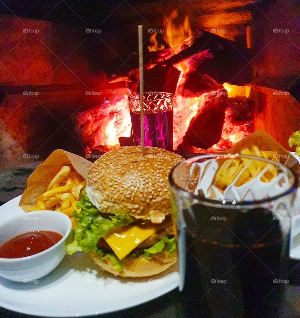 burger with fries and cola