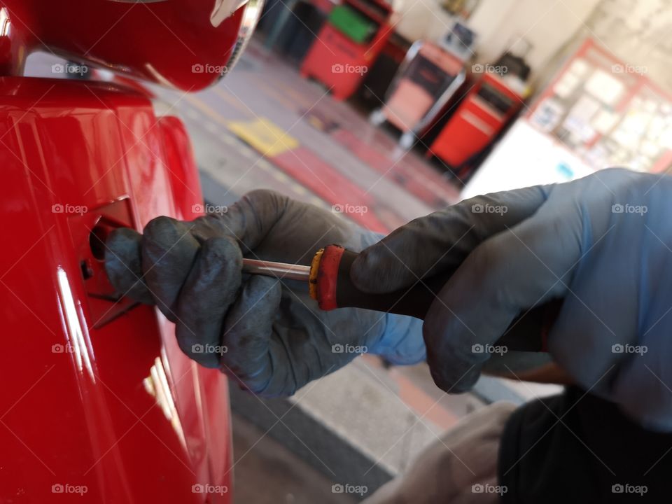 Mechanic repairs a vehicle