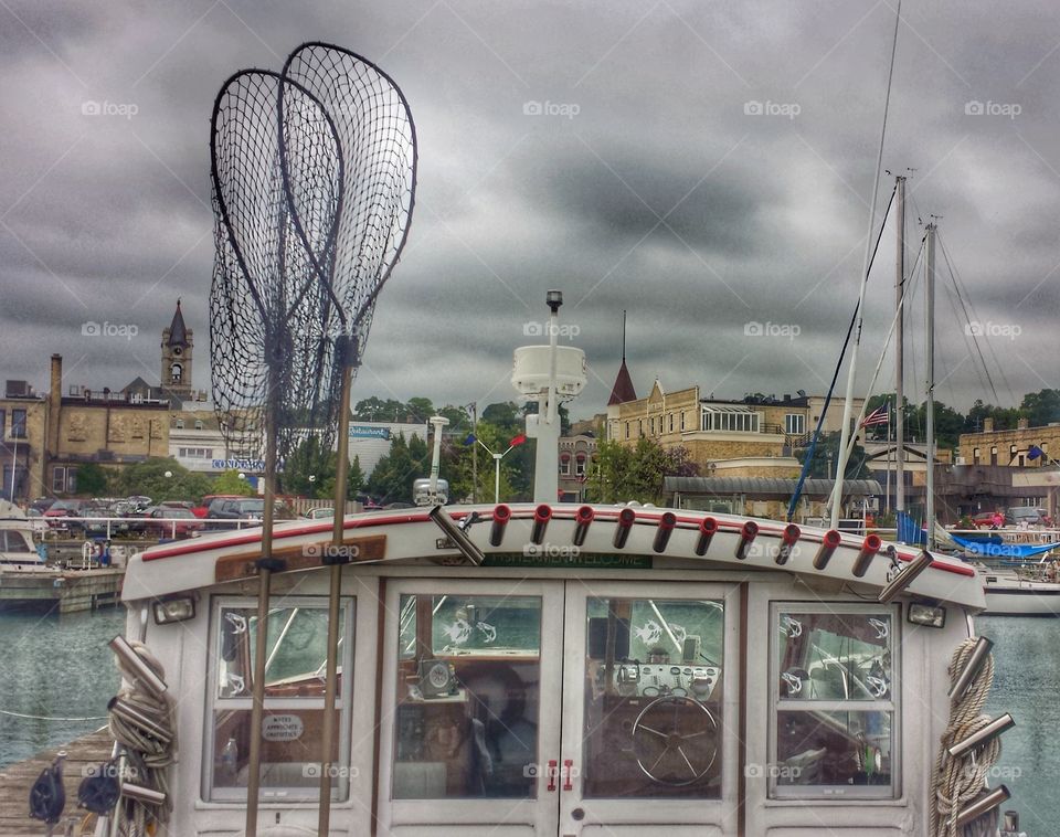 Fishing Boats in Harbor. Fish Nets