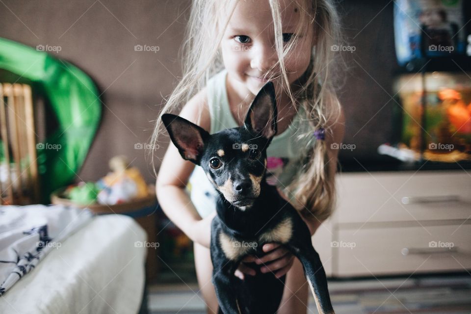 Baby with a puppy