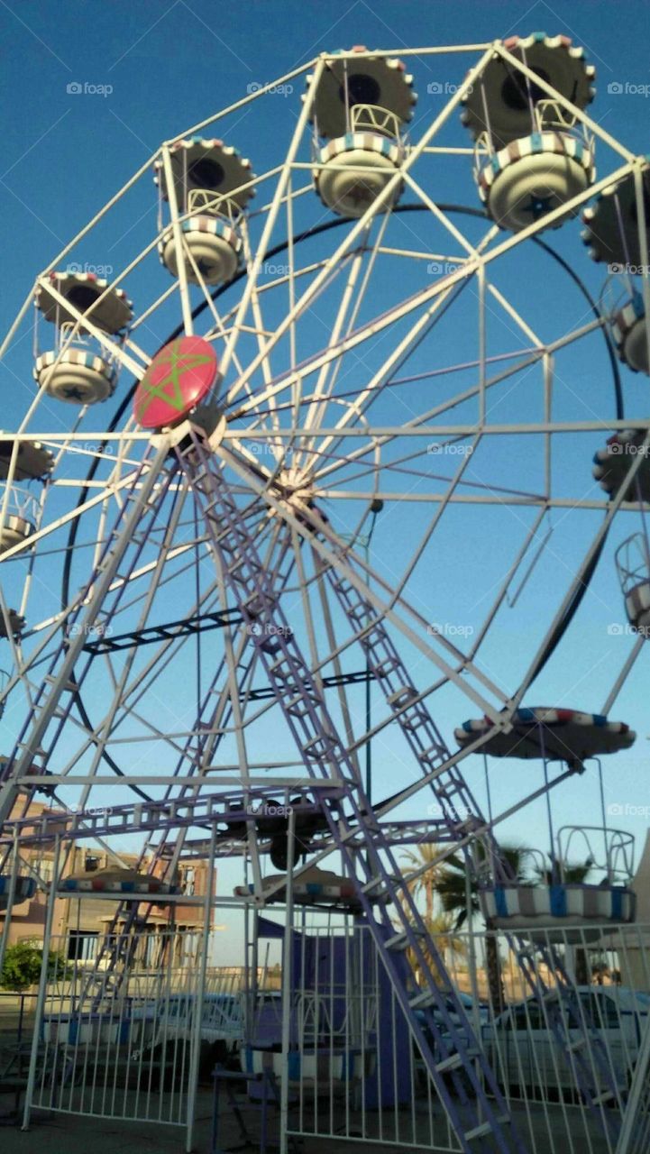 Beautiful wheel and nice moment of happiness in vacation.