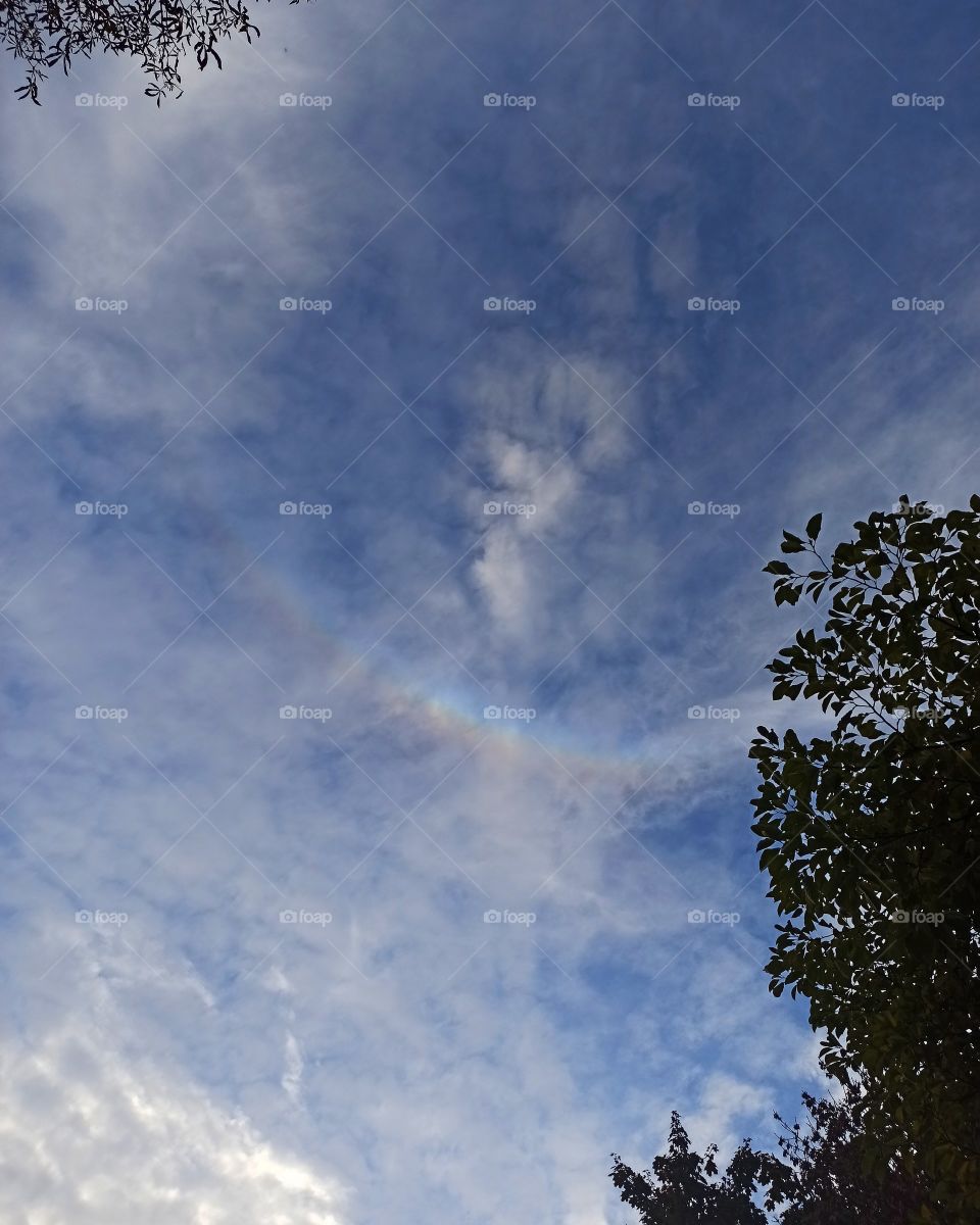 Rainbow smile in the sky