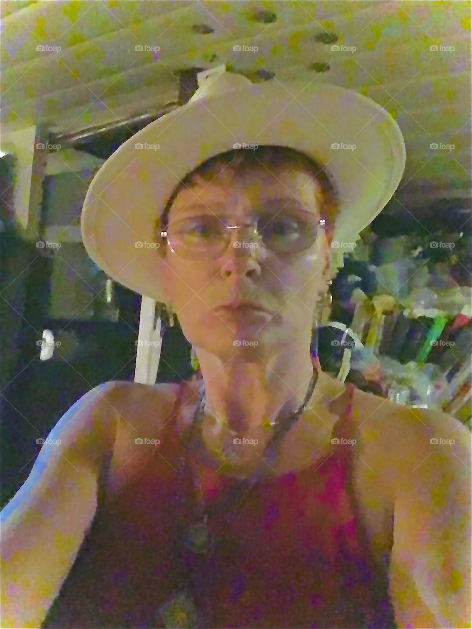 In the dim nighttime illumination of a mood light and a candle I am trying on my new Panama straw hat and went ahead right away and took a picture. 3021. Hypnotic Productions