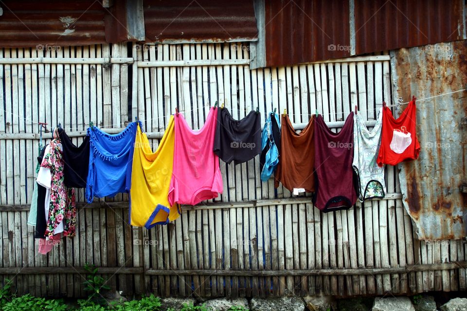 washed clothes hung to dry. washed clothes hung to dry on a clothesline