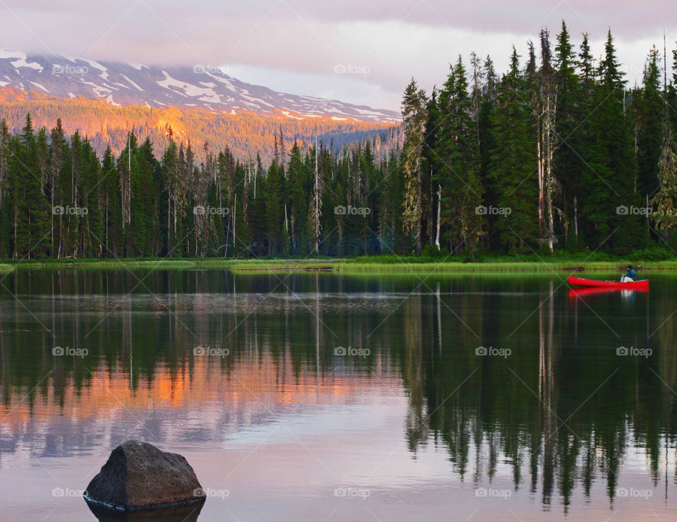 mountain sunset trees water by hddatmyers