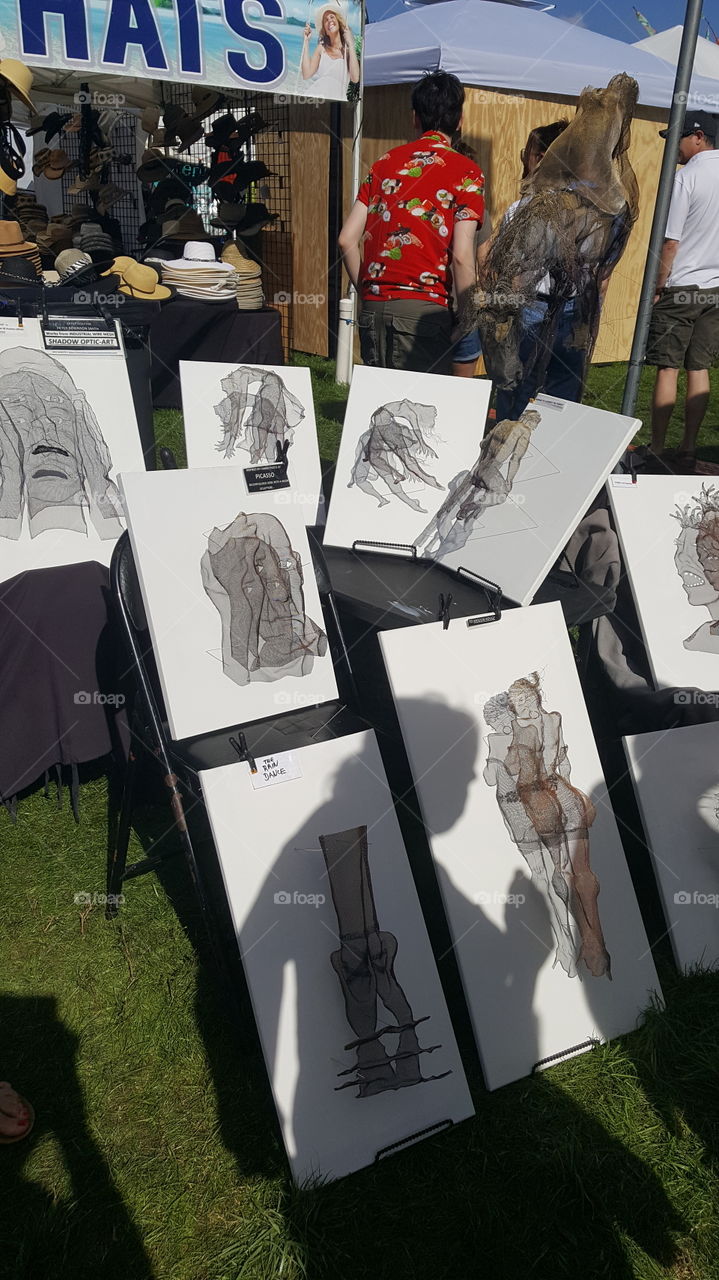 shadow art made of wire mesh at a festival