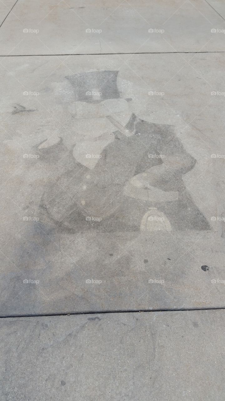 faded chalk art frog in suit