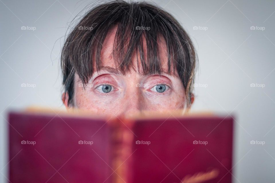 Woman is reading a book