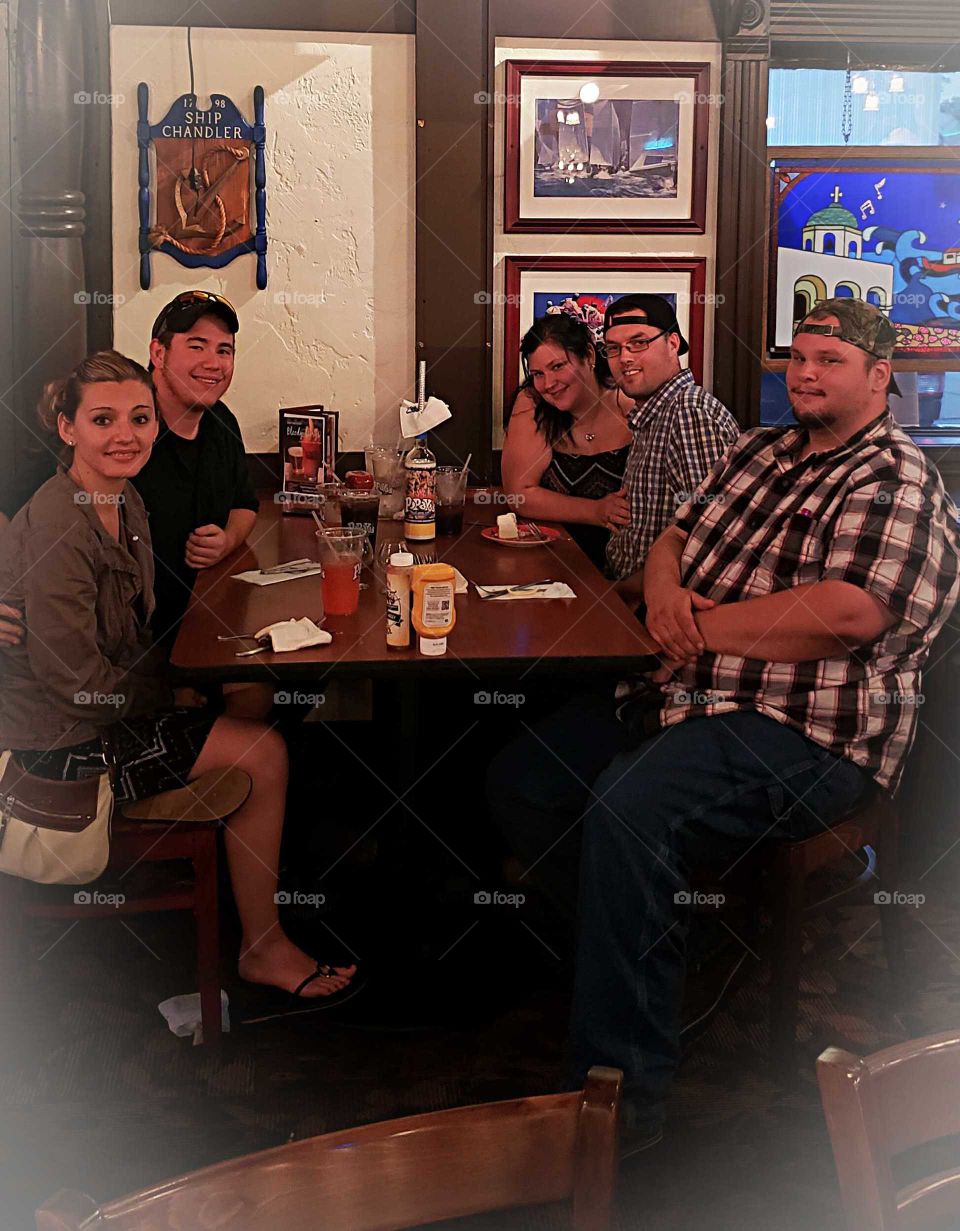 friends and family  in joying  each other  company