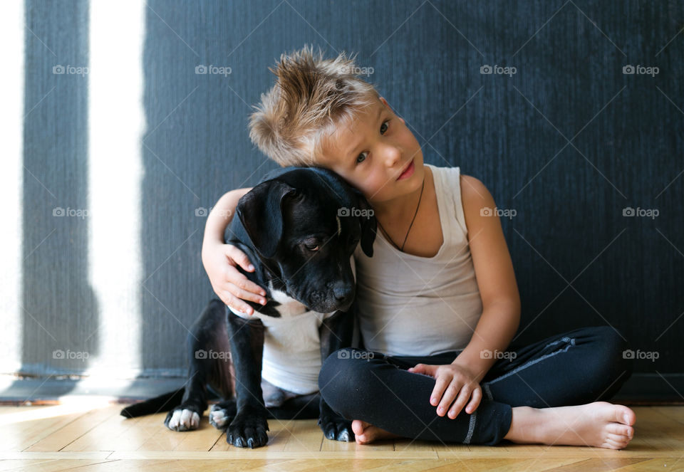 Cute boy and dog