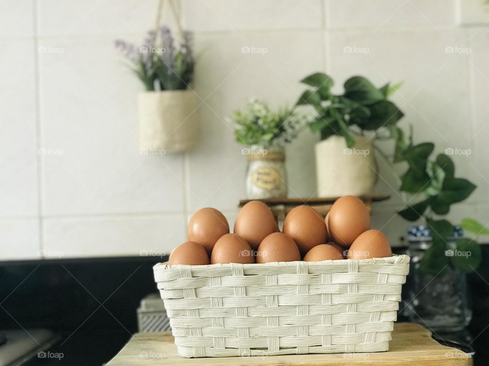 Using eco friendly reusable egg basket and plant pots instead of using plastic 