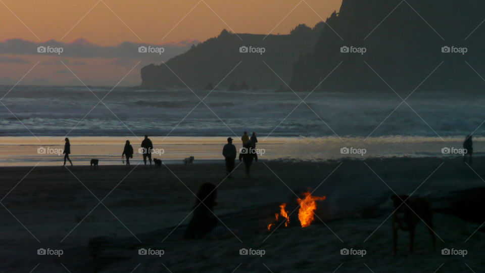 Beach fire at dusk