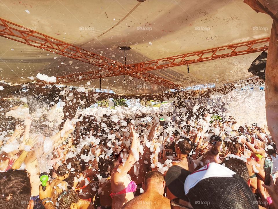 People are having fun at a foam party