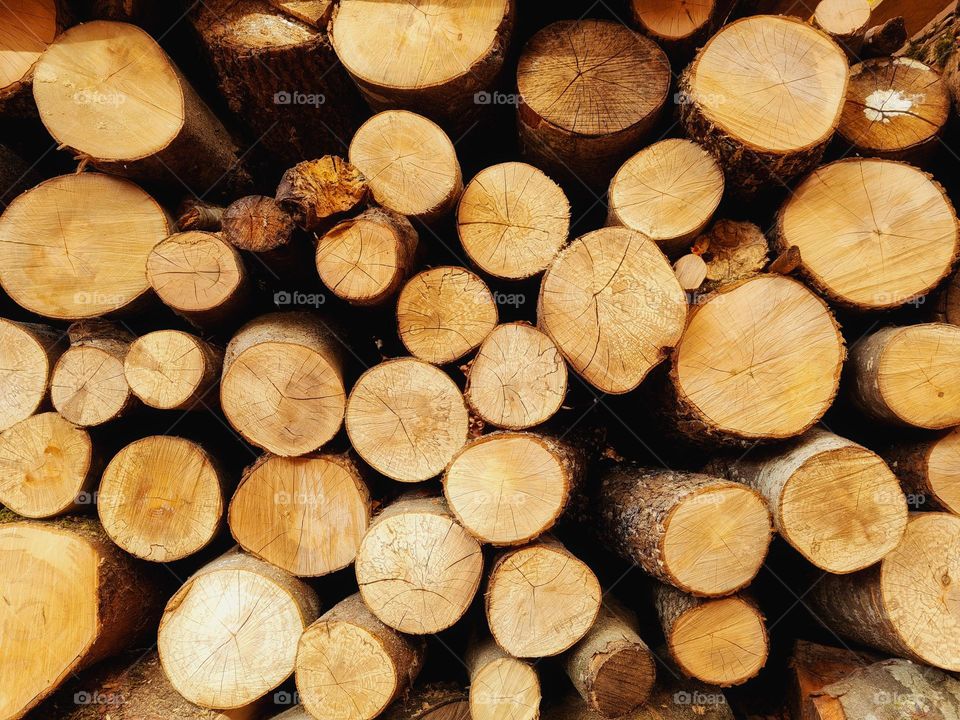 background with stacked firewood