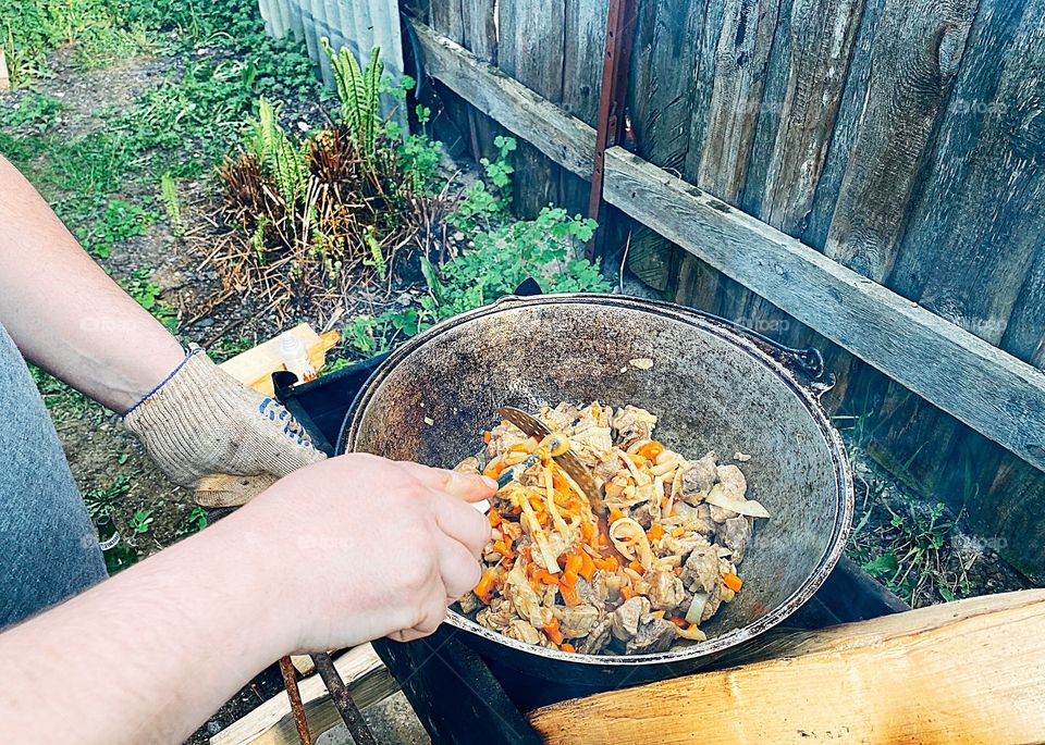 Cooking food on the campfire