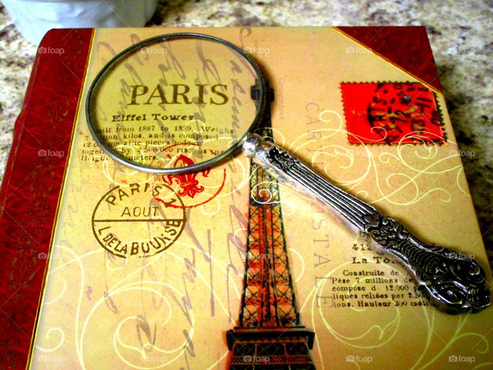 Book with magnifying glass 
