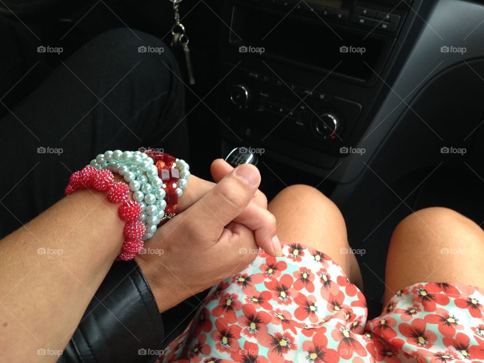 Girl and boy driving in car